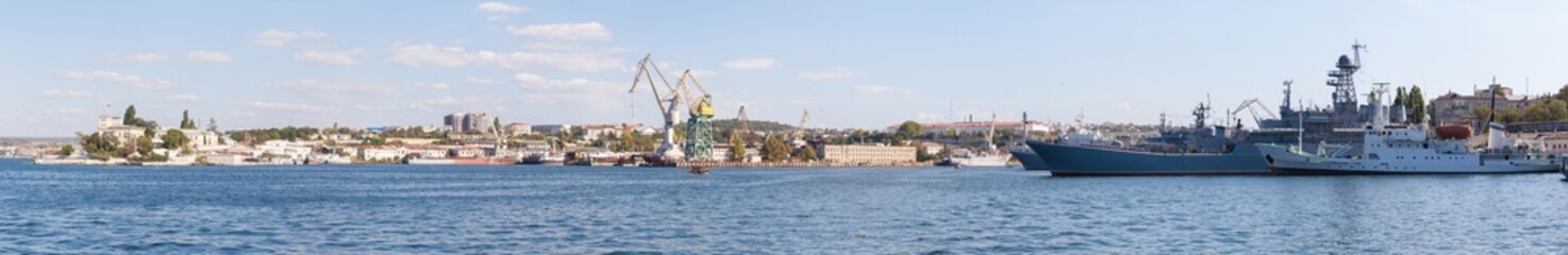 Fototapeta na wymiar Panorama of Yuzhnaya bay in Sevastopol, view to the factory and the city
