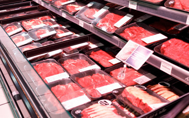 Showcase meat products in a supermarket