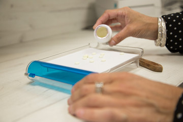 Pharmacist filling prescription