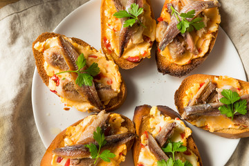 Homemade Anchovy and Sardine Crostini