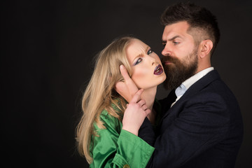 Love is on its way. Bearded man hug woman with long hair. They both love fashion. Couple in love. Intimate couple in fashion clothing. Fashion style and hair care. Style icons, copy space