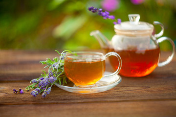 delicious green tea in beautiful glass bowl on table