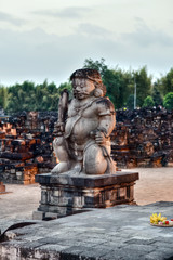 Fototapeta na wymiar A statue of a dvarapala (guardian) at the entrance of the Candi Sewu, Prambanan Temples Comlpex, Central Java, Indonesia