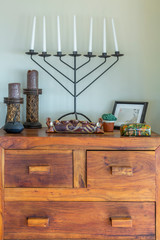 View of living room furniture, wood and retro style, with decorative elements on the top