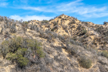 View of the dry fall mountains of California on clear morning