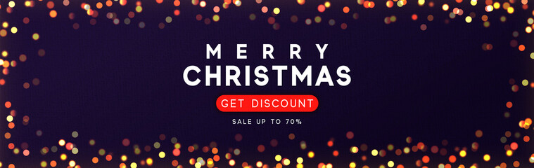 Horizontal banner with Merry Christmas background with bright glowing lights golden bokeh