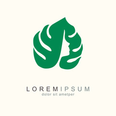 Green monstera leaf with face. Eco friendly business company icon. Ecological design. Natural symbol. Bio sign. Logo design vector template. Ecology nature element for medical, fashion, beauty © Katsiaryna Hatsak