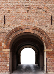 Archway in the ancient brick fortress wall