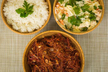 dried beef with rice and mayonnaise on the table