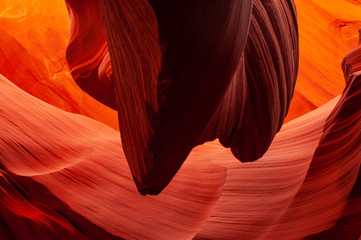 Brilliant colors of Upper Antelope Canyon, the famous slot canyon in the Navajo reservation near Page, Arizona, USA. Beautiful view of amazing sandstone formations in the famous antelope canyon