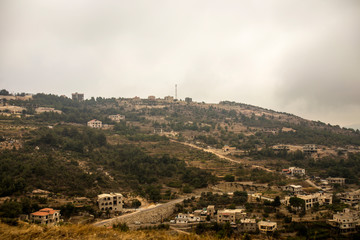 Obraz premium Landscape of Lebanon with mountain villages and vineyards on the hills. Lebanon