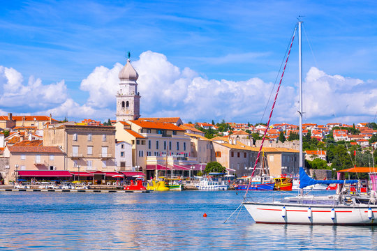 Wonderful romantic summer in old town at Adriatic sea. Summer panoramic coastline landscape. Boats and yachts in harbor. Krk. Krk island. Croatia. Europe.