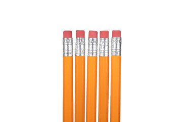 Close up on a row of pencil erasers isolated on white
