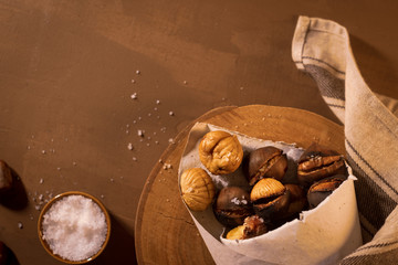 Roasted chestnuts in a paper cone