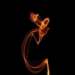 Isolated abstract fire effect on black night background. Digital light in motion.
