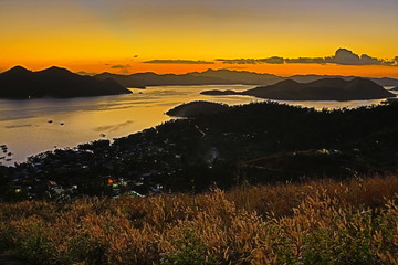 sunset on coast of sea