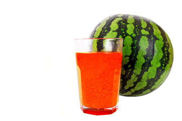 wet glass of fresh watermelon juice and watermelon on white background