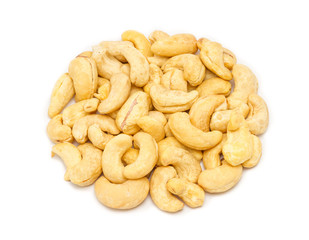 Handful of raw cashew seeds (Anacardium occidentale) without shell, close up, isolated on white background