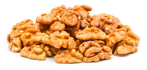 Handful of peeled walnut (Juglans regia) without shell, close up, isolated on white background