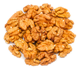 Handful of peeled walnut (Juglans regia) without shell, close up, isolated on white background