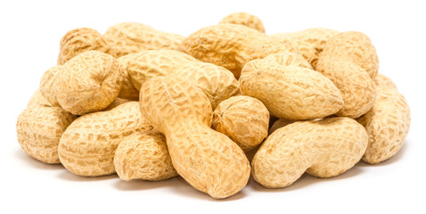 Handful of peanut (Arachis hypogaea) in the shell, close up, isolated on white background