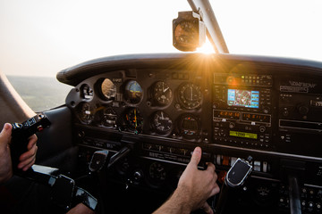 Aircraft cockpit at sunset