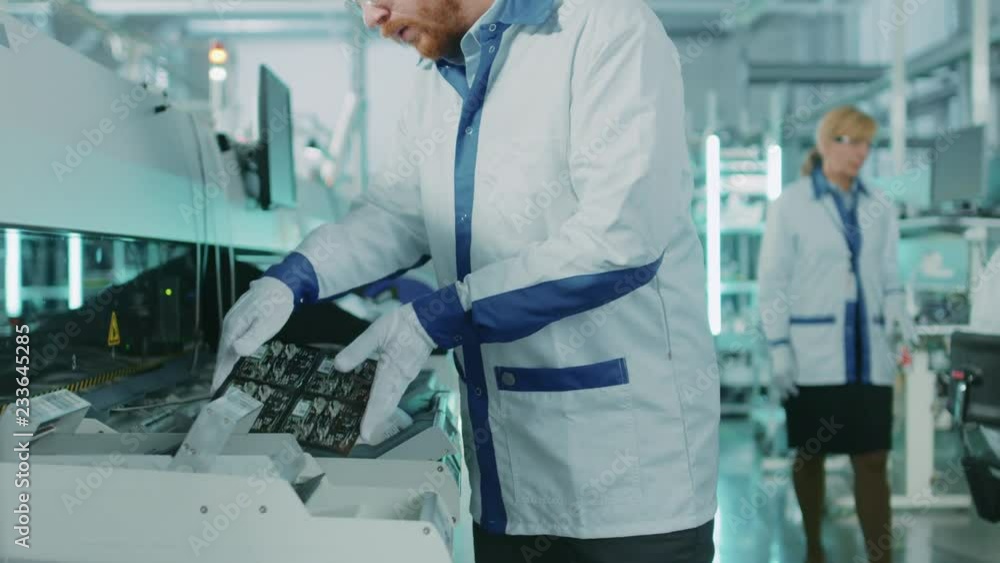 Poster high-tech factory: quality control inspector picks up electronic printed circuit board and checks it