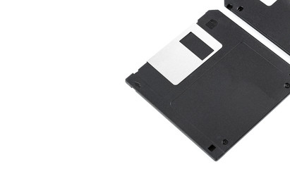 Old computer diskette over white background. Black Diskette.