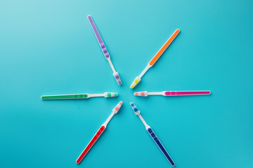 toothbrushes in the form of a star on a blue background