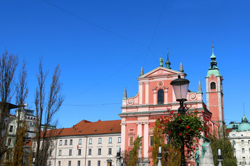Fototapeta na wymiar Franciscan Church of the Annunciation is a landmark on Preseren square in central Ljubljana, Slovenia. 