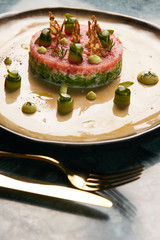 Fresh Beef tartare Steak with egg yolk, pistachios