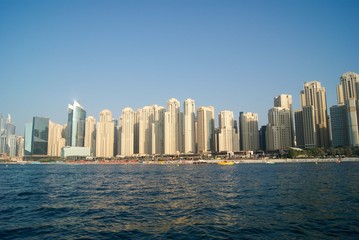 Fototapeta na wymiar Panorama of Dubai skyline from the sea