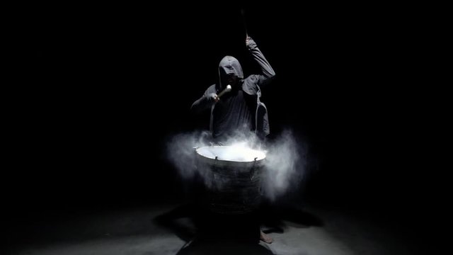 emotional drummer on a black background