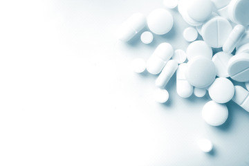 Fototapeta Pharmacy theme, white medicine tablets antibiotic pills. obraz