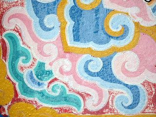 Elements from a pattern painted on an old Buddhist temple wall makes a pretty pale colored patterned background