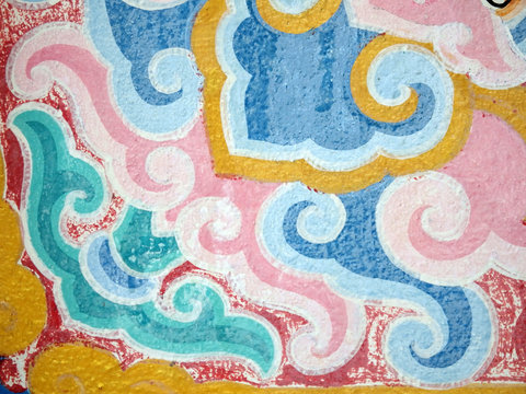 Elements from a pattern painted on an old Buddhist temple wall makes a pretty pale colored patterned background