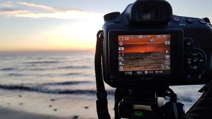 camera photograph sunset