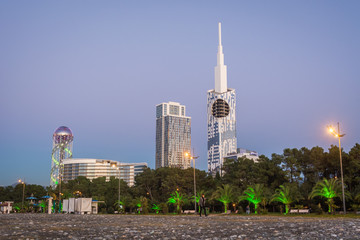 Obraz premium Batumi, Adjara, Georgia - October 2018: Batumi city skyline view from the beach at dusk