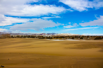 Dunes mountains and sky