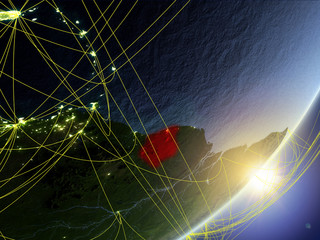 Suriname on model of planet Earth with network during sunrise. Concept of new technology, communication and travel.