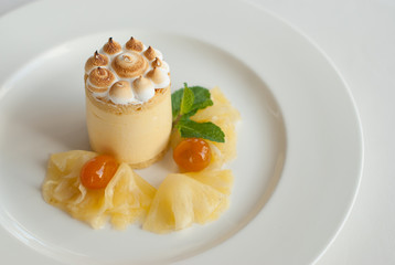 Mango souffle with fresh meringue and pineapple