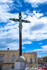 Crucifix near the entrance of the Jardins du Peyrou in Montpellier in Languedoc, France