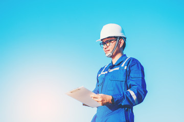 engineers operating and check generating power of solar power plant on solar rooftop
