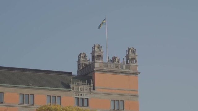 21045_A_flag_of_Sweden_on_the_top_of_the_building_in_Stockholm.mov