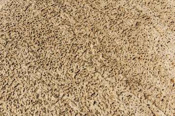 texture of rough stone on the shores of the Mediterranean sea as a background.