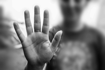 Violence, Abuse, Punishment, Woman raised her hand for dissuade, campaign stop violence against Woman, black and white color.