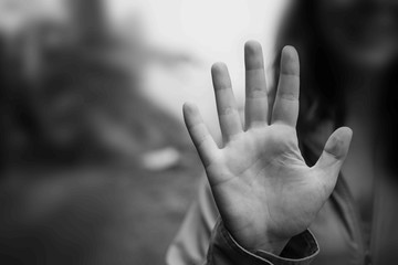 Violence, Abuse, Punishment, Woman raised her hand for dissuade, campaign stop violence against Woman, black and white color.