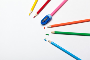 Wooden colorful ordinary pencils isolated on a white background