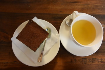 Tiramisu in a glass with tea