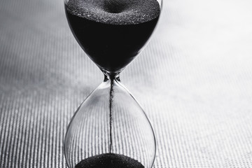 Hourglass on dark background